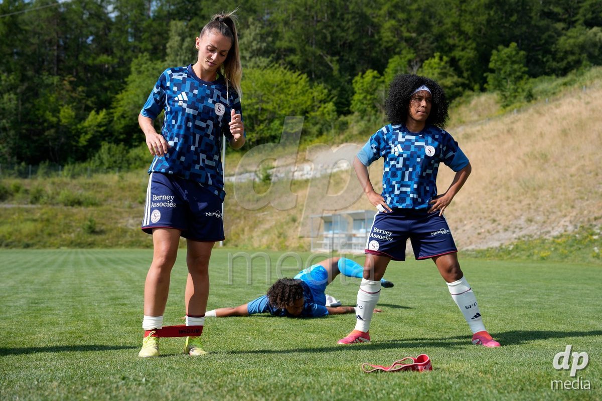 Crans-Montana, Switzerland - July 25: Chaney Amanda (22 SFCCF) and Cardia Mickaella Francoise Halooa (12 SFCCF) during the AXA Women's Super League match between Servette FC Chenois Feminin and FC Sion Feminin at Stade du Christ-Roi on July 25, 2026 in Crans-Montana, Switzerland.