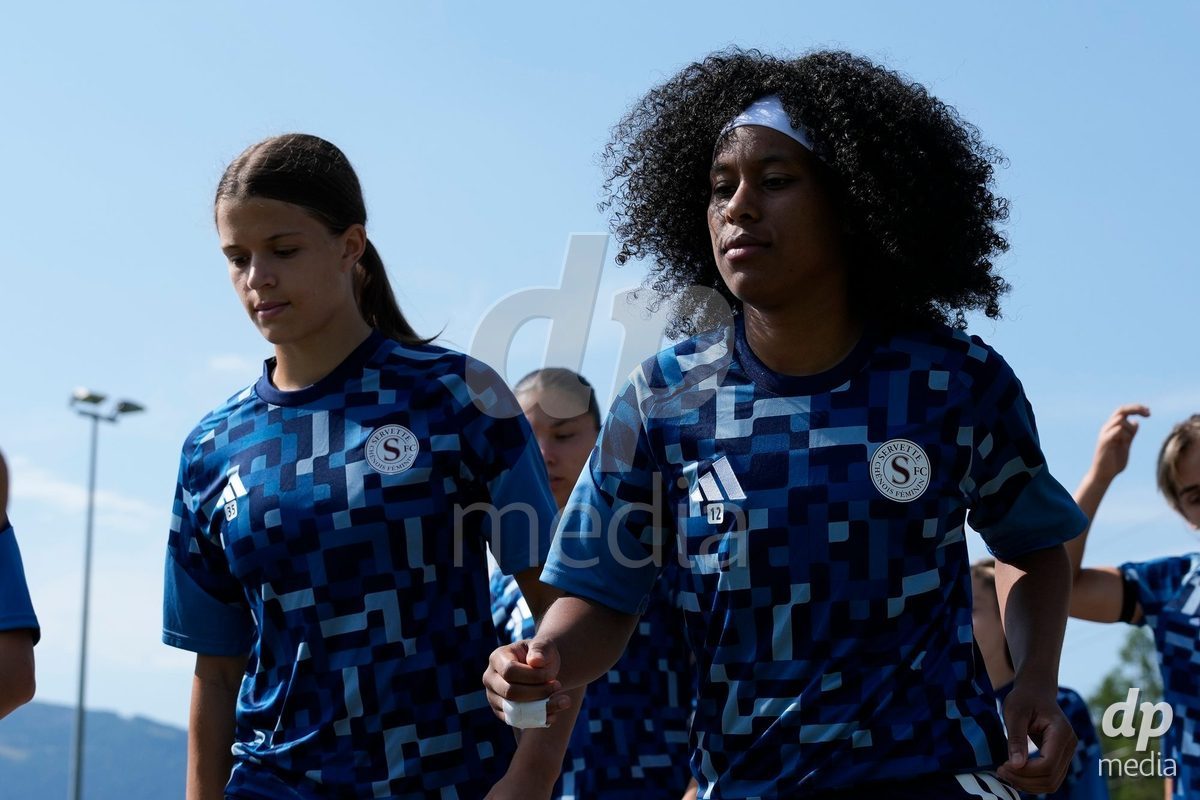 Crans-Montana, Switzerland - July 25: Petzoldt Emma Paola (35 SFCCF) and Cardia Mickaella Francoise Halooa (12 SFCCF) during the AXA Women's Super League match between Servette FC Chenois Feminin and FC Sion Feminin at Stade du Christ-Roi on July 25, 2026 in Crans-Montana, Switzerland.