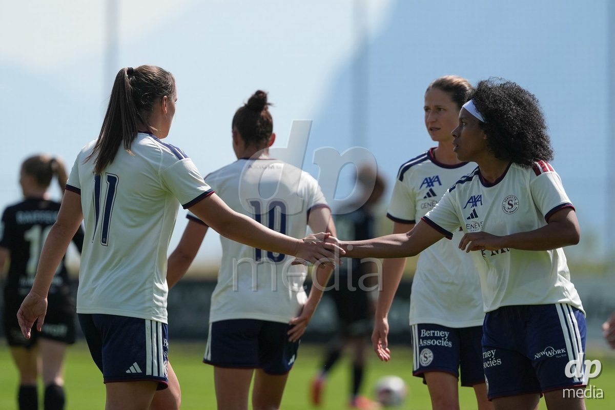 Crans-Montana, Switzerland - July 25: Cardia Mickaella Francoise Halooa (12 SFCCF) celebrates with Magdalena Izabela Sobal (11 SFCCF) after a goal during the AXA Women's Super League match between Servette FC Chenois Feminin and FC Sion Feminin at Stade du Christ-Roi on July 25, 2026 in Crans-Montana, Switzerland.