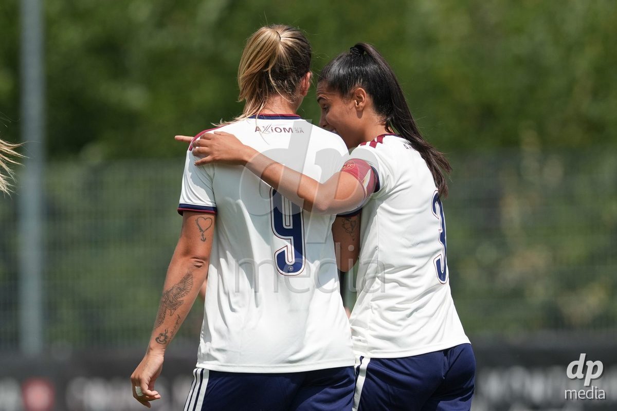 Crans-Montana, Switzerland - July 25: Daina Bourma (3 SFCCF) celebrates with Gloria Marinelli (9 SFCCF) during the AXA Women's Super League match between Servette FC Chenois Feminin and FC Sion Feminin at Stade du Christ-Roi on July 25, 2026 in Crans-Montana, Switzerland.