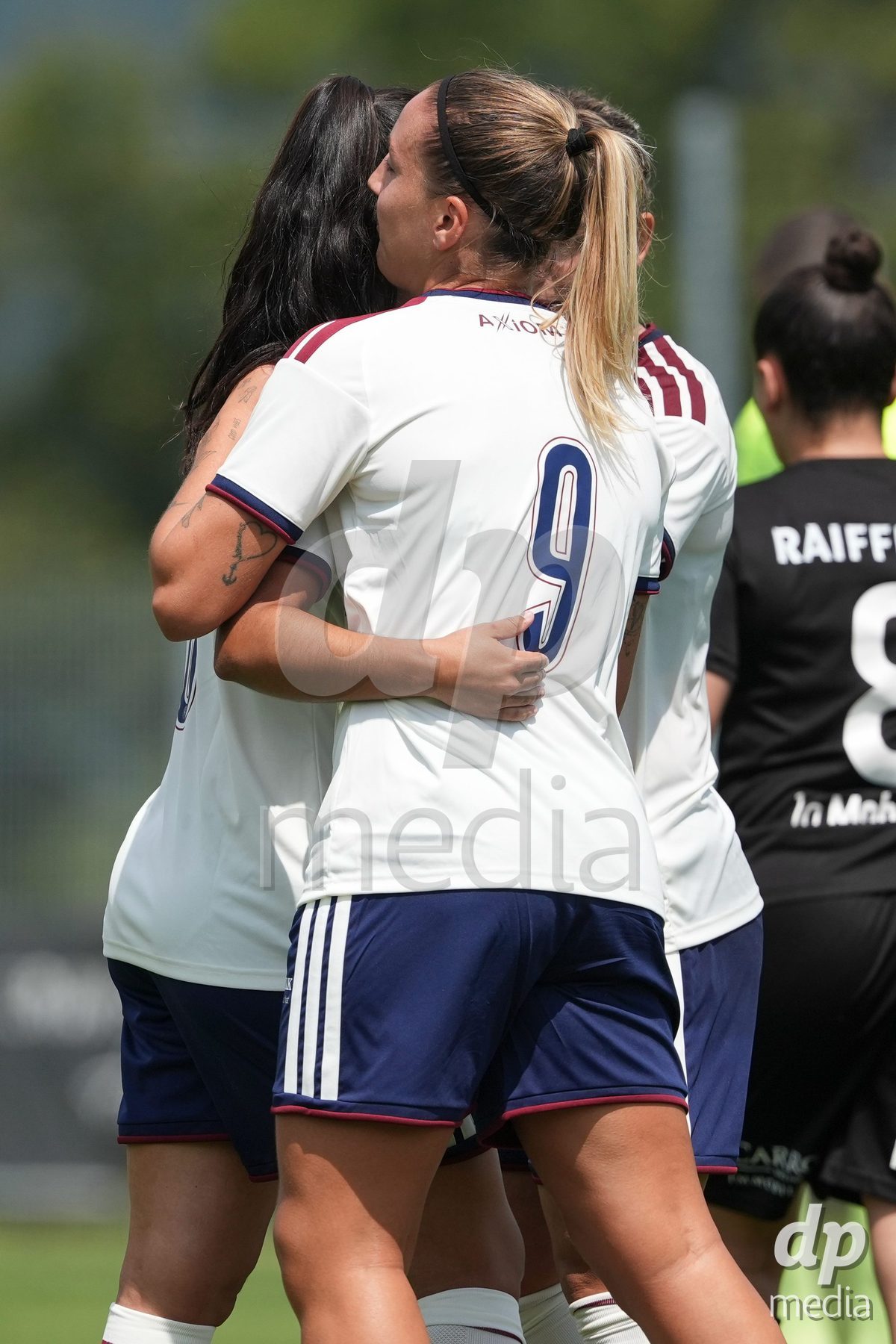 Crans-Montana, Switzerland - July 25: Gloria Marinelli (9 SFCCF) celebrates her goal with Hernandez Diaz Paola (6 SFCCF) during the AXA Women's Super League match between Servette FC Chenois Feminin and FC Sion Feminin at Stade du Christ-Roi on July 25, 2026 in Crans-Montana, Switzerland.