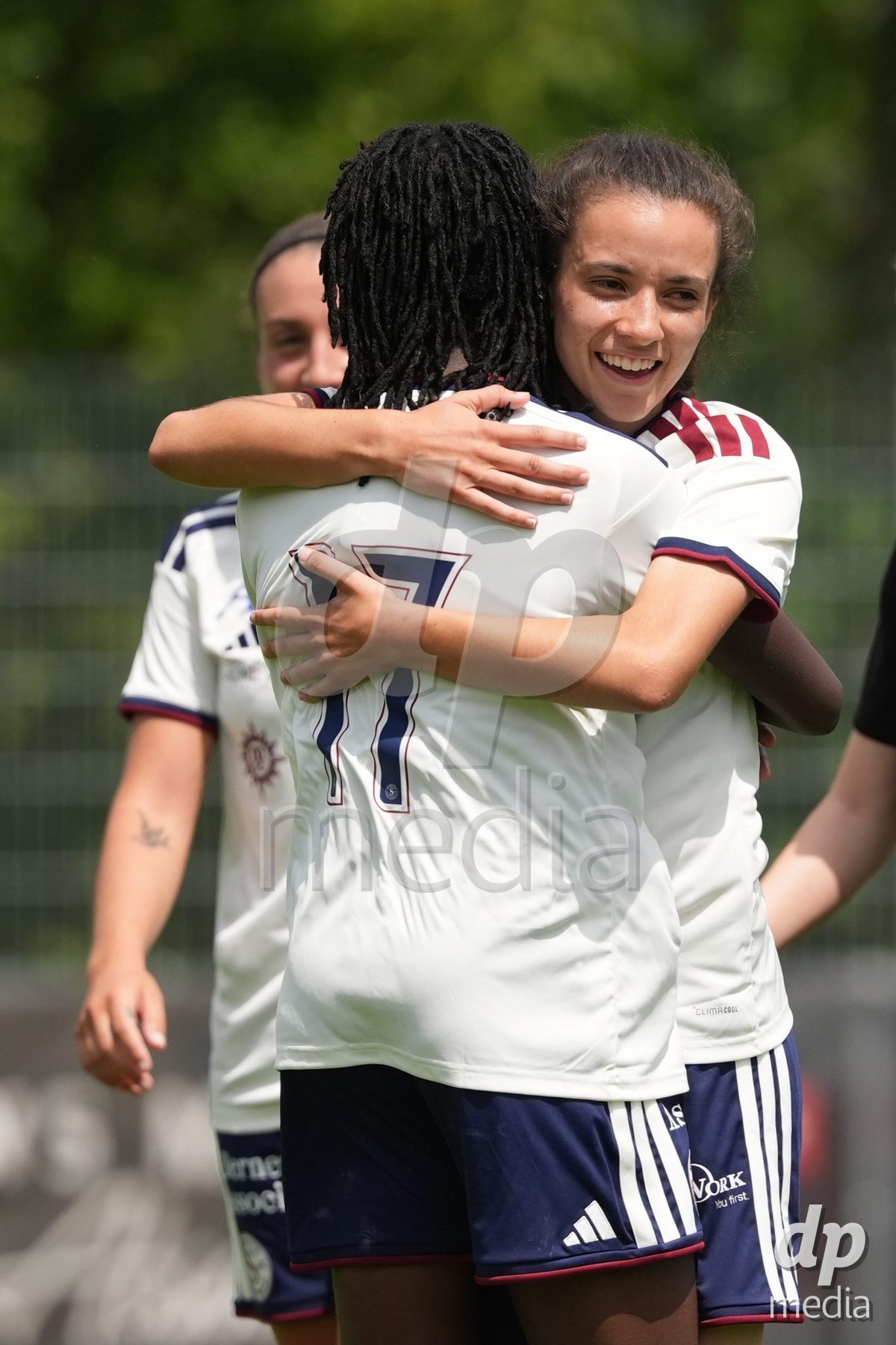 Crans-Montana, Switzerland - July 25: Camila Mingard (37 SFCCF) celebrates her goal with Garance Nein (17 SFCCF) during the AXA Women's Super League match between Servette FC Chenois Feminin and FC Sion Feminin at Stade du Christ-Roi on July 25, 2026 in Crans-Montana, Switzerland.