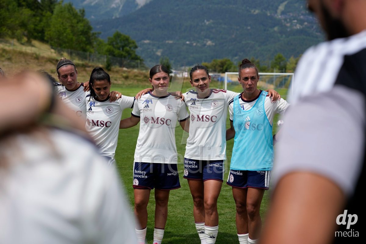 Crans-Montana, Switzerland - July 25: Gloria Marinelli (9 SFCCF), Chiara Wallin (20 SFCCF) and Daina Bourma (3 SFCCF) and the team after the AXA Women's Super League match between Servette FC Chenois Feminin and FC Sion Feminin at Stade du Christ-Roi on July 25, 2026 in Crans-Montana, Switzerland.