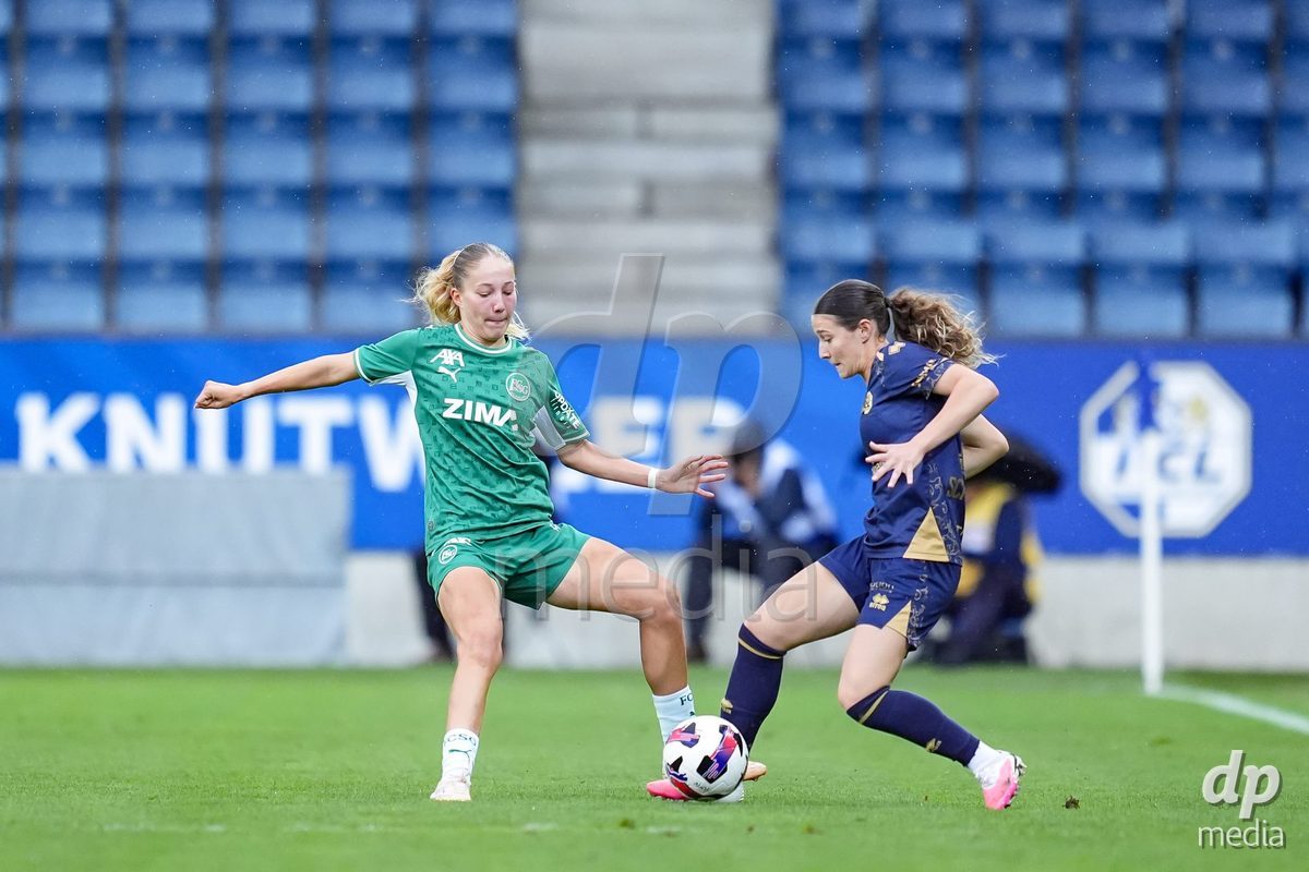 Luzern, Switzerland - August 28: Johanna Thuer of FC St. Gallen (L) and Ramona Schallberger of FC Luzern (R) battle for the ball (duel) during the AXA Women's Super League match between FC Luzern and FC St. Gallen 1879 at thermoplan arena on August 28, 2026 in Luzern, Switzerland.