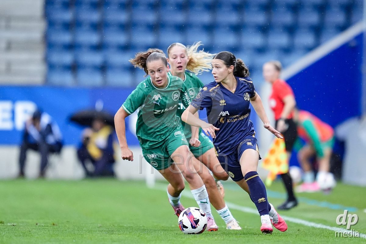 Luzern, Switzerland - August 28: Lia Ammann of FC St. Gallen  (L) and Ramona Schallberger of FC Luzern (R) battle for the ball (duel) during the AXA Women's Super League match between FC Luzern and FC St. Gallen 1879 at thermoplan arena on August 28, 2026 in Luzern, Switzerland.