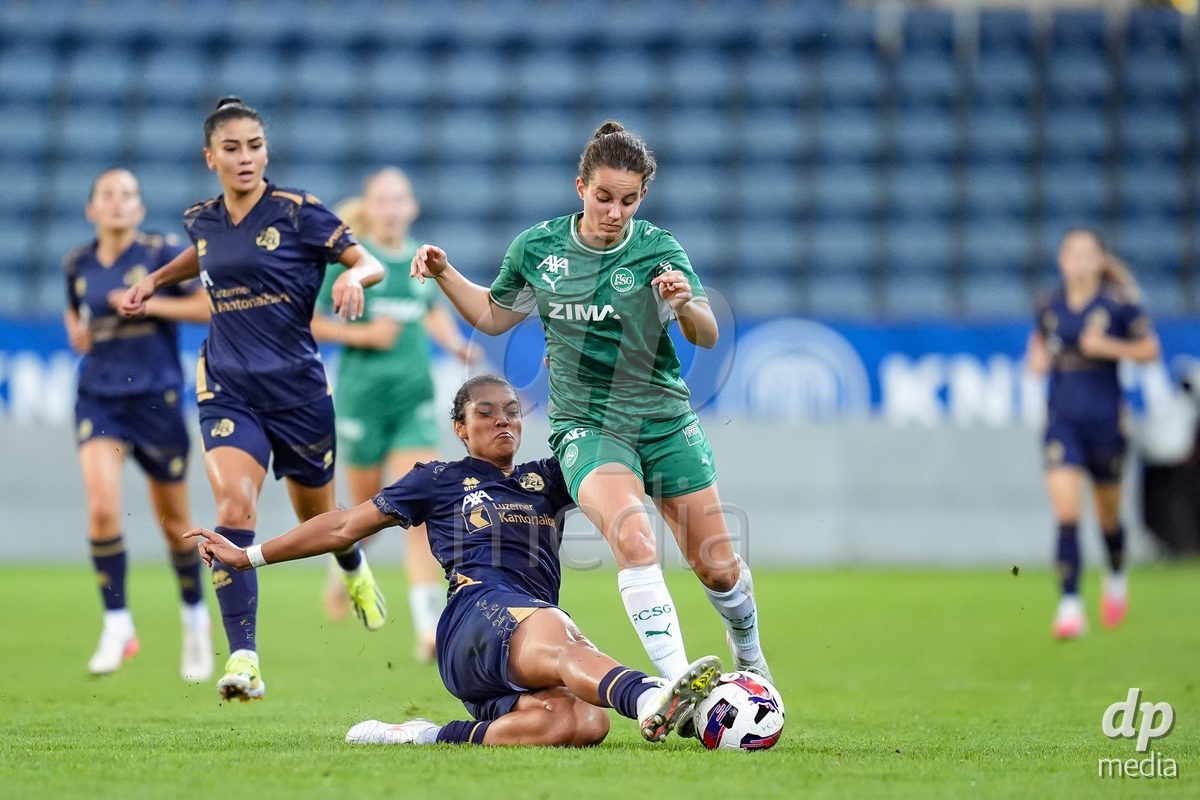 Luzern, Switzerland - August 28: Aldiana Amuchie of FC Luzern (L) and Yael Aeberhard of FC St. Gallen (R) battle for the ball (duel) during the AXA Women's Super League match between FC Luzern and FC St. Gallen 1879 at thermoplan arena on August 28, 2026 in Luzern, Switzerland.