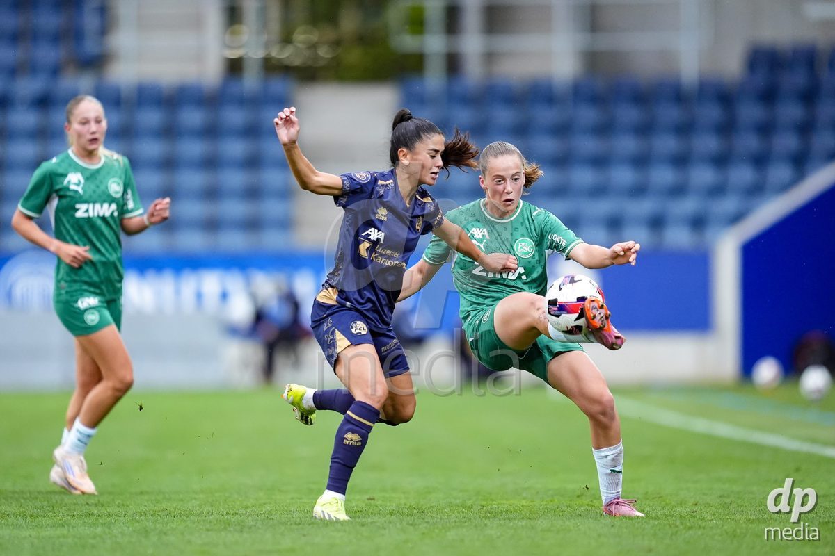 Luzern, Switzerland - August 28: Michele Schnider of FC Luzern (L) and Lia Ammann of FC St. Gallen (R) battle for the ball (duel) during the AXA Women's Super League match between FC Luzern and FC St. Gallen 1879 at thermoplan arena on August 28, 2026 in Luzern, Switzerland.