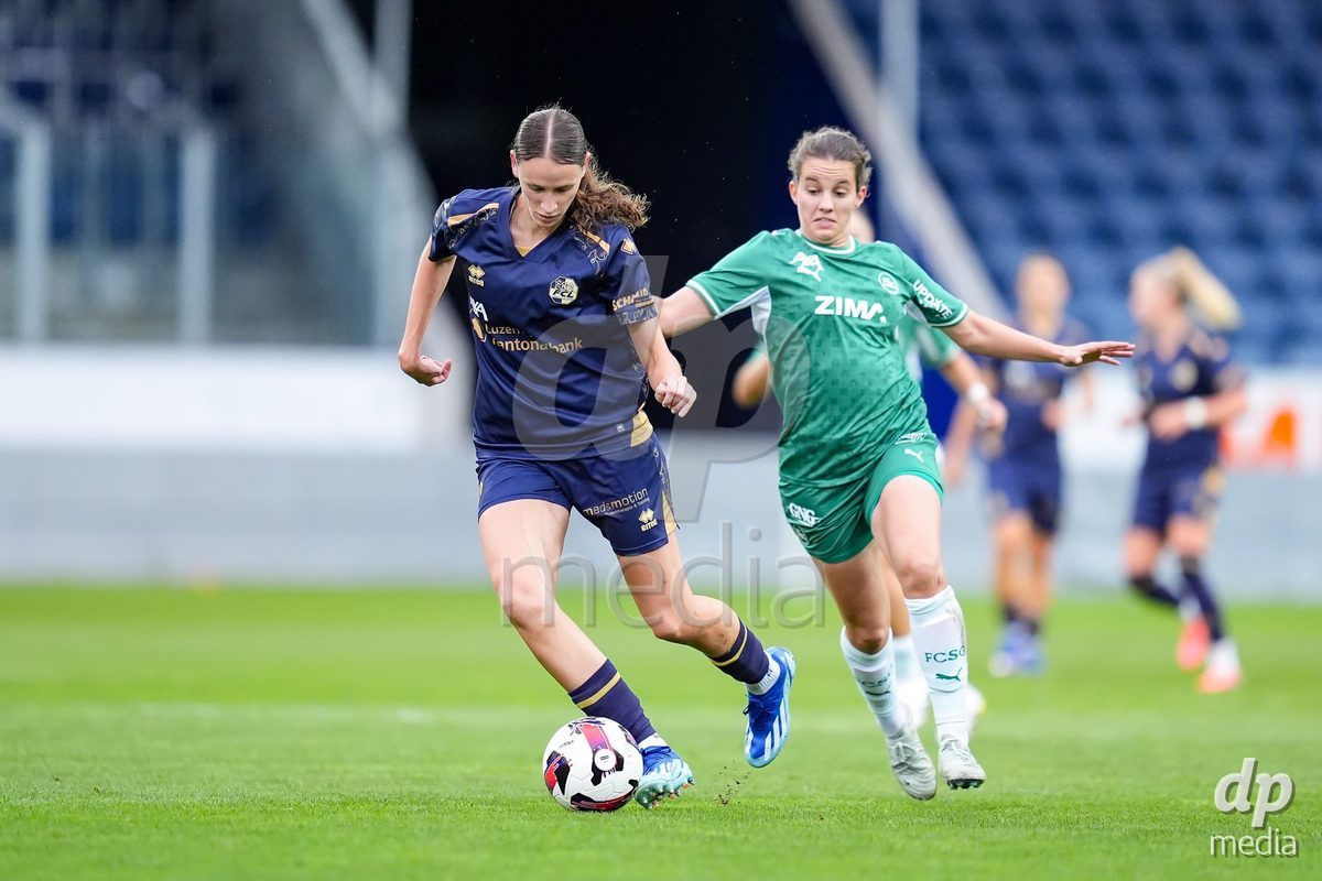 Luzern, Switzerland - August 28: Lena Walti of FC Luzern (L) and Chantal Wyser of FC St. Gallen (R) battle for the ball (duel)  during the AXA Women's Super League match between FC Luzern and FC St. Gallen 1879 at thermoplan arena on August 28, 2026 in Luzern, Switzerland.