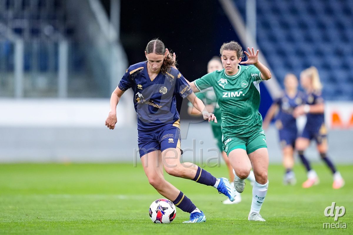 Luzern, Switzerland - August 28: Lena Walti of FC Luzern (L) and Chantal Wyser of FC St. Gallen (R) battle for the ball (duel)  during the AXA Women's Super League match between FC Luzern and FC St. Gallen 1879 at thermoplan arena on August 28, 2026 in Luzern, Switzerland.