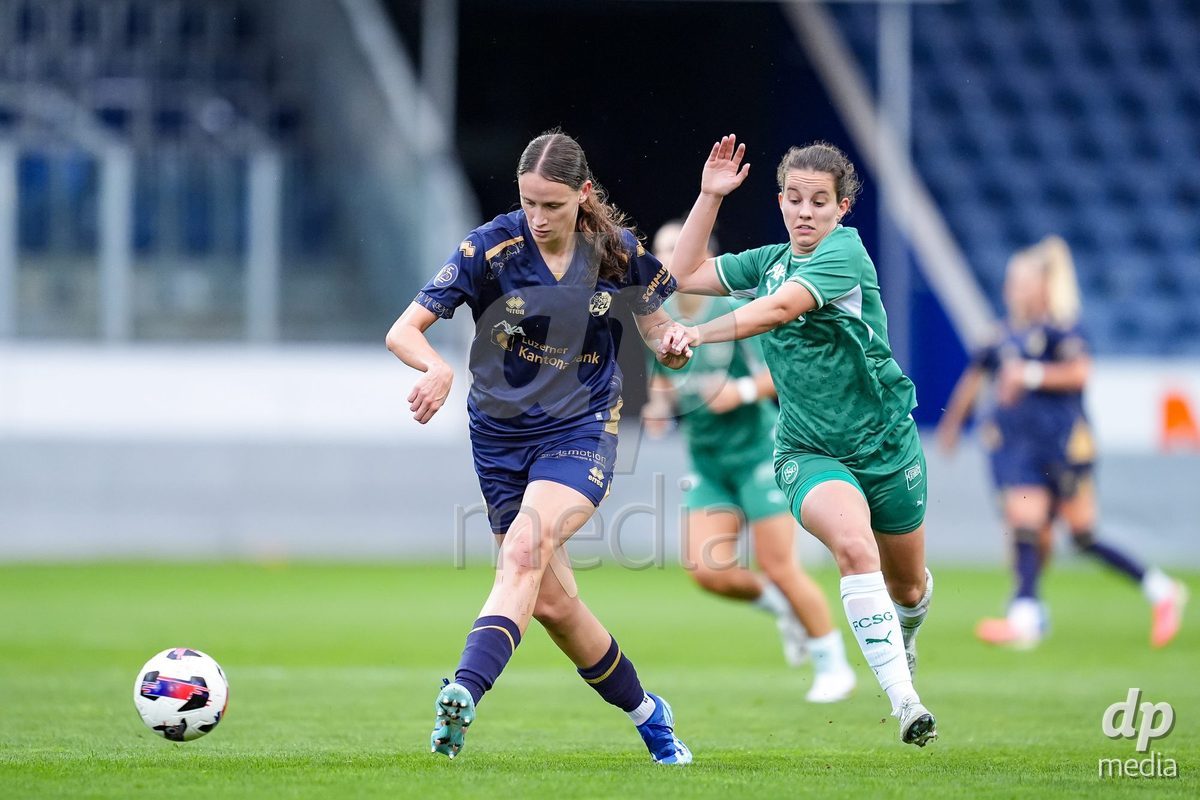 Luzern, Switzerland - August 28: Lena Walti of FC Luzern (L) and Chantal Wyser of FC St. Gallen (R) battle for the ball (duel)  during the AXA Women's Super League match between FC Luzern and FC St. Gallen 1879 at thermoplan arena on August 28, 2026 in Luzern, Switzerland.