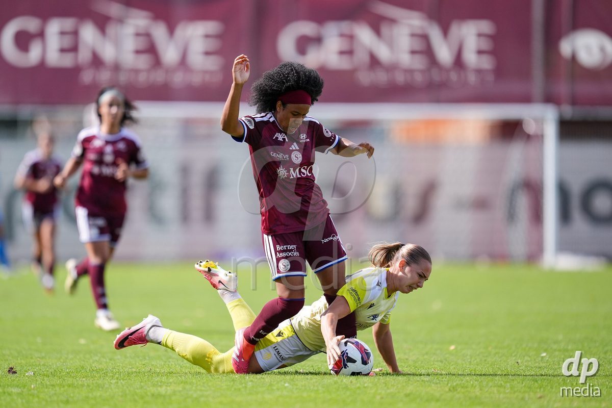 Geneva, Switzerland - August 29: Mickaella Francoise Halooa Cardia of Servette (L) and Krystyna Flis of FC Basel (R) battle for the ball (duel)  during the AXA Women's Super League match between Servette FC Chenois Feminin and FC Basel 1893 at Stade de Trois-Chene on August 29, 2026 in Geneva, Switzerland.