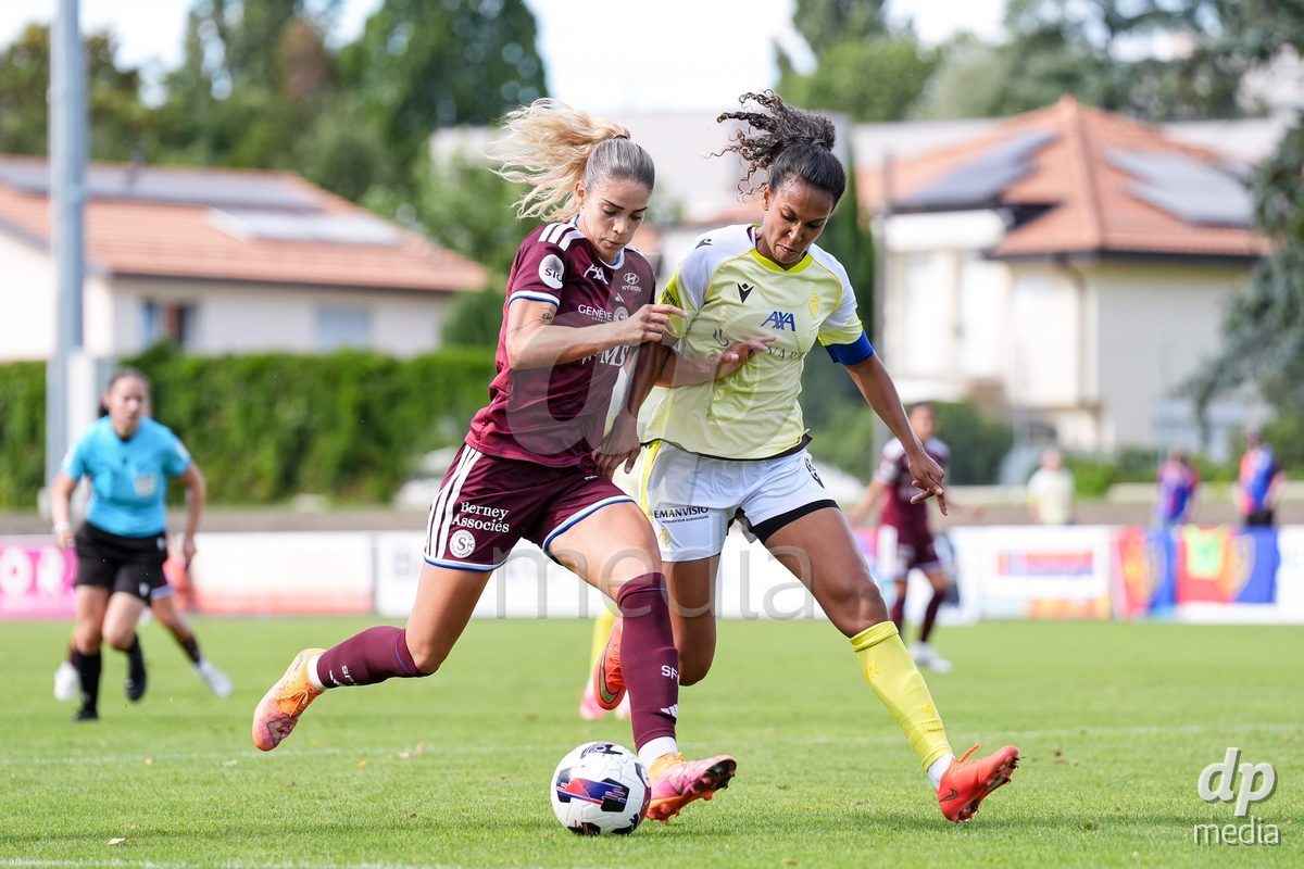 Geneva, Switzerland - August 29: Stefanie De Alem da Eira of Servette (L) and Coumba Louisa Sow of FC Basel (R) battle for the ball (duel) during the AXA Women's Super League match between Servette FC Chenois Feminin and FC Basel 1893 at Stade de Trois-Chene on August 29, 2026 in Geneva, Switzerland.