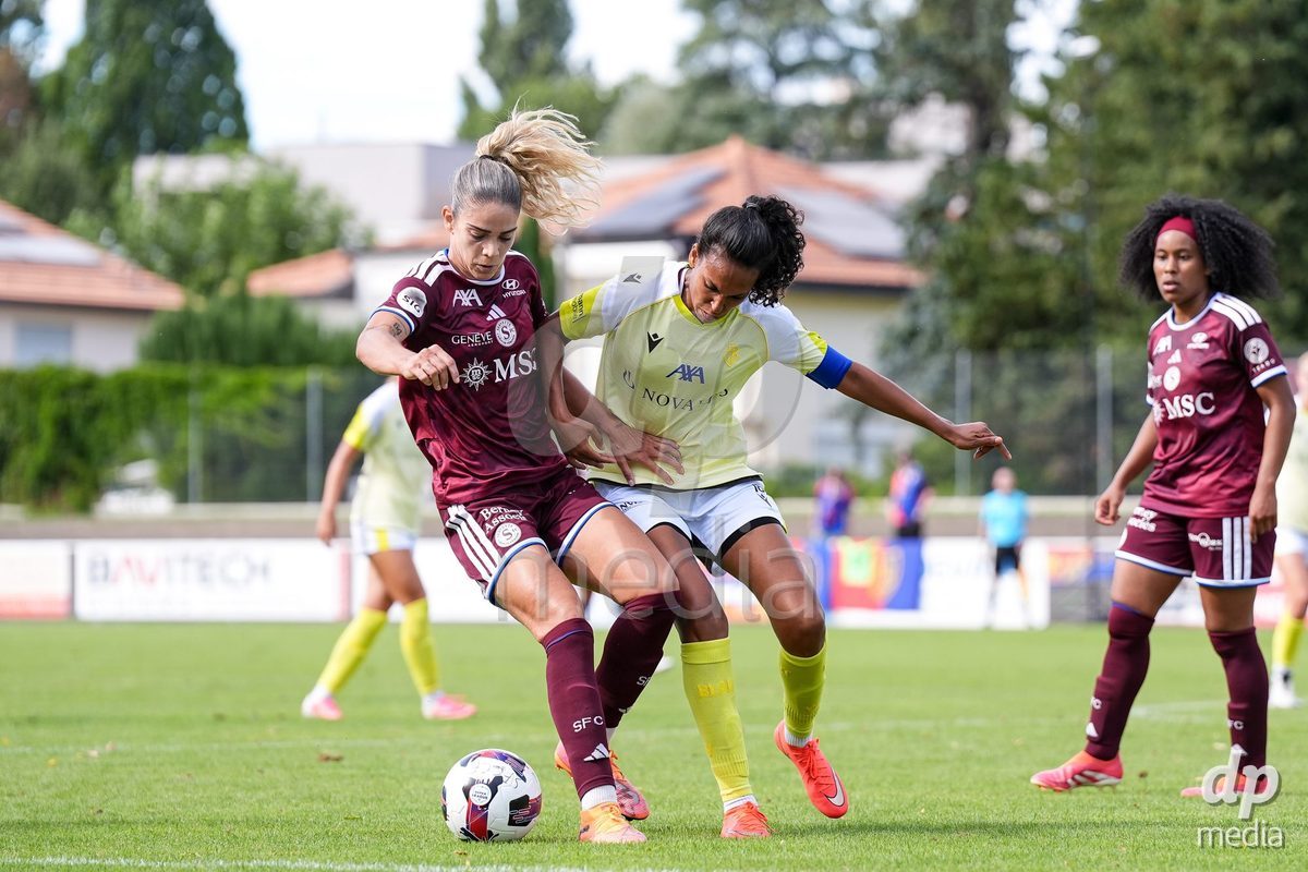 Geneva, Switzerland - August 29: Stefanie De Alem da Eira of Servette (L) and Coumba Louisa Sow of FC Basel (R) battle for the ball (duel) during the AXA Women's Super League match between Servette FC Chenois Feminin and FC Basel 1893 at Stade de Trois-Chene on August 29, 2026 in Geneva, Switzerland.