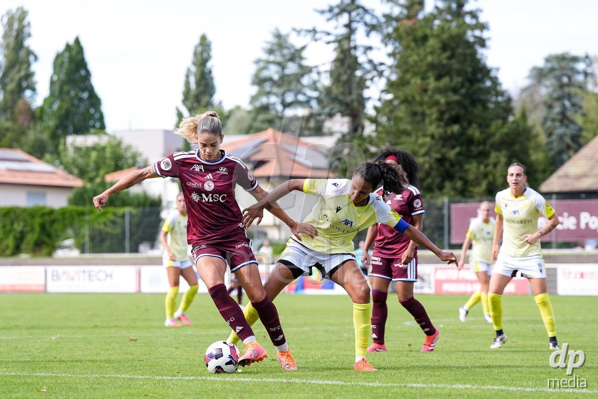 Geneva, Switzerland - August 29: Stefanie De Alem da Eira of Servette (L) and Coumba Louisa Sow of FC Basel (R) battle for the ball (duel) during the AXA Women's Super League match between Servette FC Chenois Feminin and FC Basel 1893 at Stade de Trois-Chene on August 29, 2026 in Geneva, Switzerland.