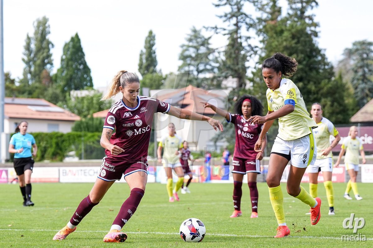 Geneva, Switzerland - August 29: Stefanie De Alem da Eira of Servette (L) and Coumba Louisa Sow of FC Basel (R) battle for the ball (duel) during the AXA Women's Super League match between Servette FC Chenois Feminin and FC Basel 1893 at Stade de Trois-Chene on August 29, 2026 in Geneva, Switzerland.