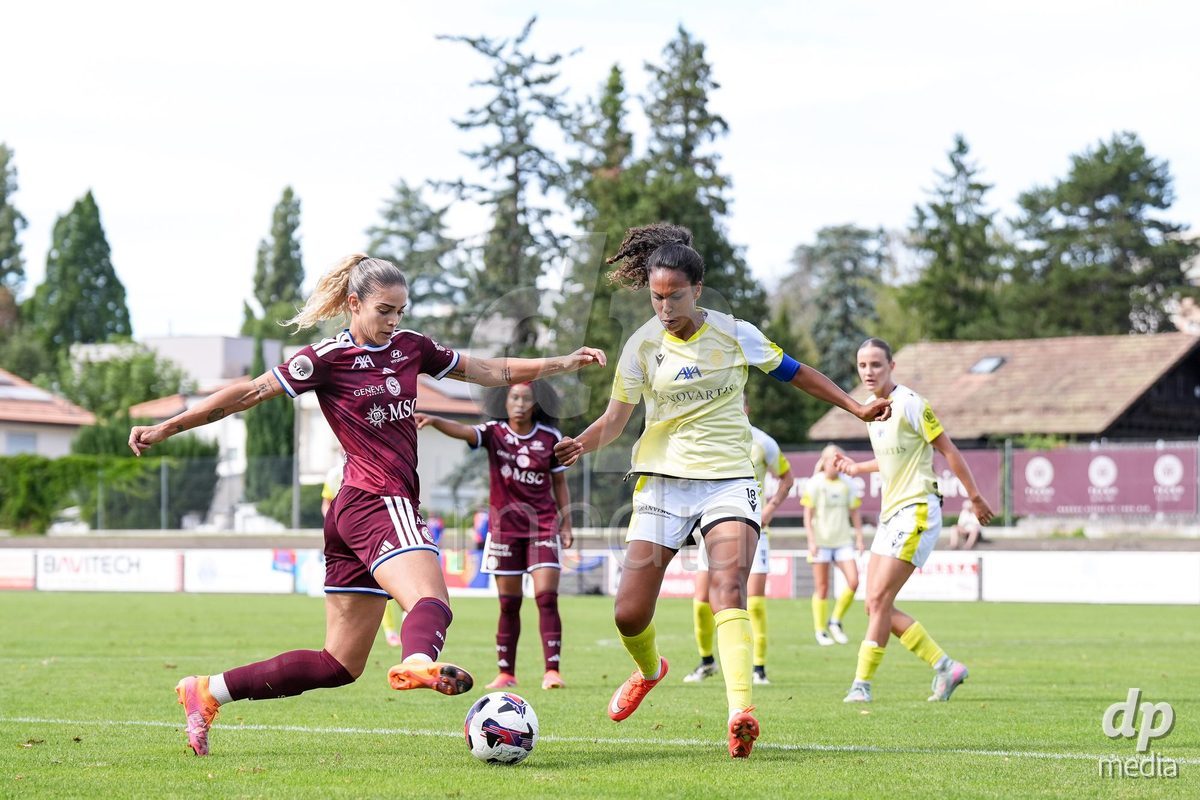 Geneva, Switzerland - August 29: Stefanie De Alem da Eira of Servette (L) and Coumba Louisa Sow of FC Basel (R) battle for the ball (duel) during the AXA Women's Super League match between Servette FC Chenois Feminin and FC Basel 1893 at Stade de Trois-Chene on August 29, 2026 in Geneva, Switzerland.