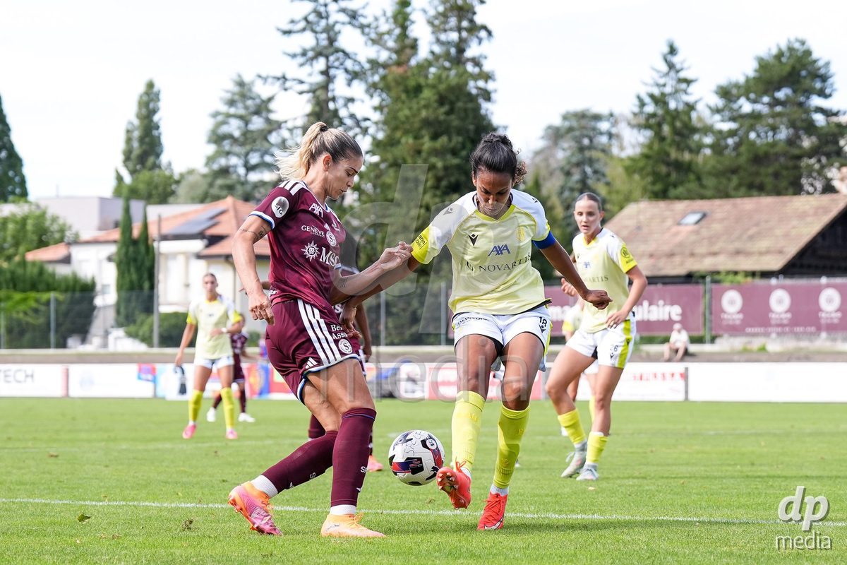 Geneva, Switzerland - August 29: Stefanie De Alem da Eira of Servette (L) and Coumba Louisa Sow of FC Basel (R) battle for the ball (duel) during the AXA Women's Super League match between Servette FC Chenois Feminin and FC Basel 1893 at Stade de Trois-Chene on August 29, 2026 in Geneva, Switzerland.