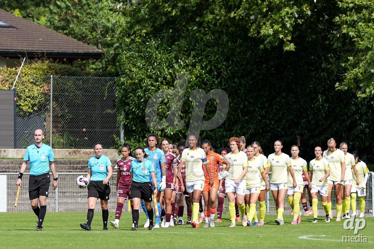 Geneva, Switzerland - August 29: Players walk in during the AXA Women's Super League match between Servette FC Chenois Feminin and FC Basel 1893 at Stade de Trois-Chene on August 29, 2026 in Geneva, Switzerland.