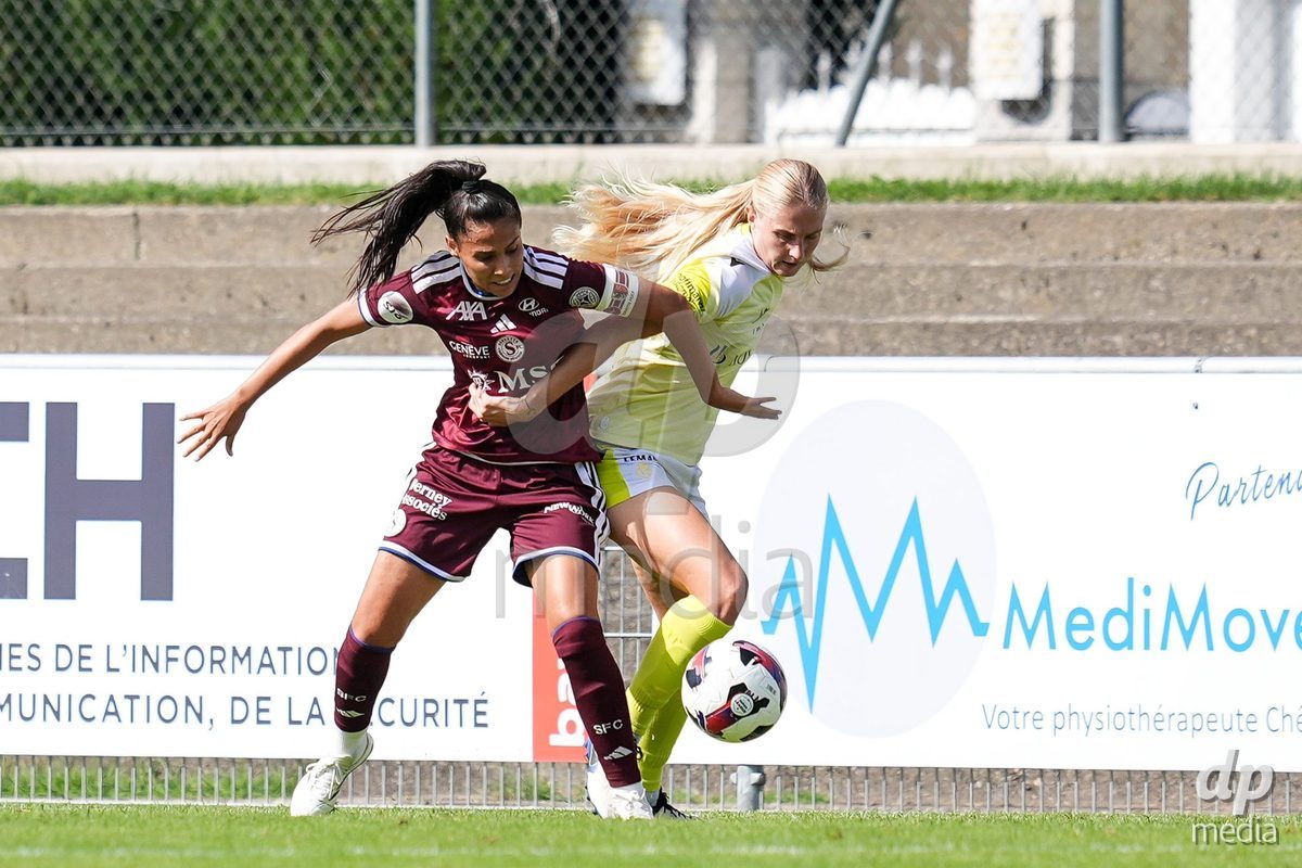 Geneva, Switzerland - August 29: Daina Bourma of Servette FC Chenois Feminin (L) and Jacqueline Anne Hand of FC Basel (R) battle for the ball (duel) during the AXA Women's Super League match between Servette FC Chenois Feminin and FC Basel 1893 at Stade de Trois-Chene on August 29, 2026 in Geneva, Switzerland.