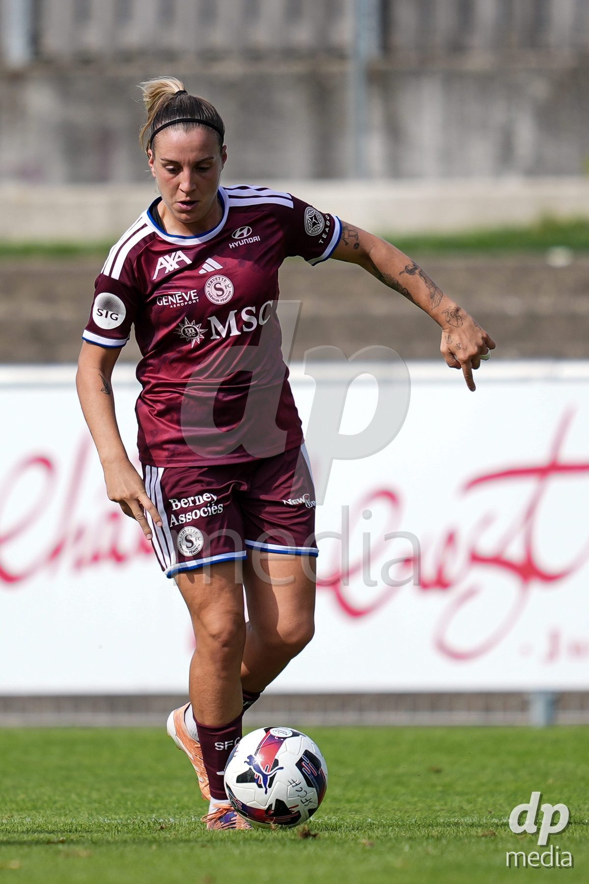 Geneva, Switzerland - August 29: Gloria Marinelli of Servette FC Chenois Feminin controls the ball during the AXA Women's Super League match between Servette FC Chenois Feminin and FC Basel 1893 at Stade de Trois-Chene on August 29, 2026 in Geneva, Switzerland.