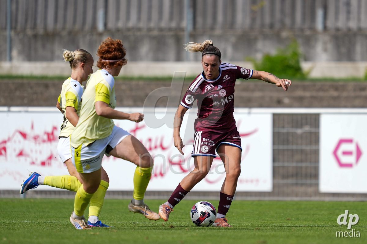 Geneva, Switzerland - August 29: Gloria Marinelli of Servette FC Chenois Feminin (R) shoots the ball during the AXA Women's Super League match between Servette FC Chenois Feminin and FC Basel 1893 at Stade de Trois-Chene on August 29, 2026 in Geneva, Switzerland.