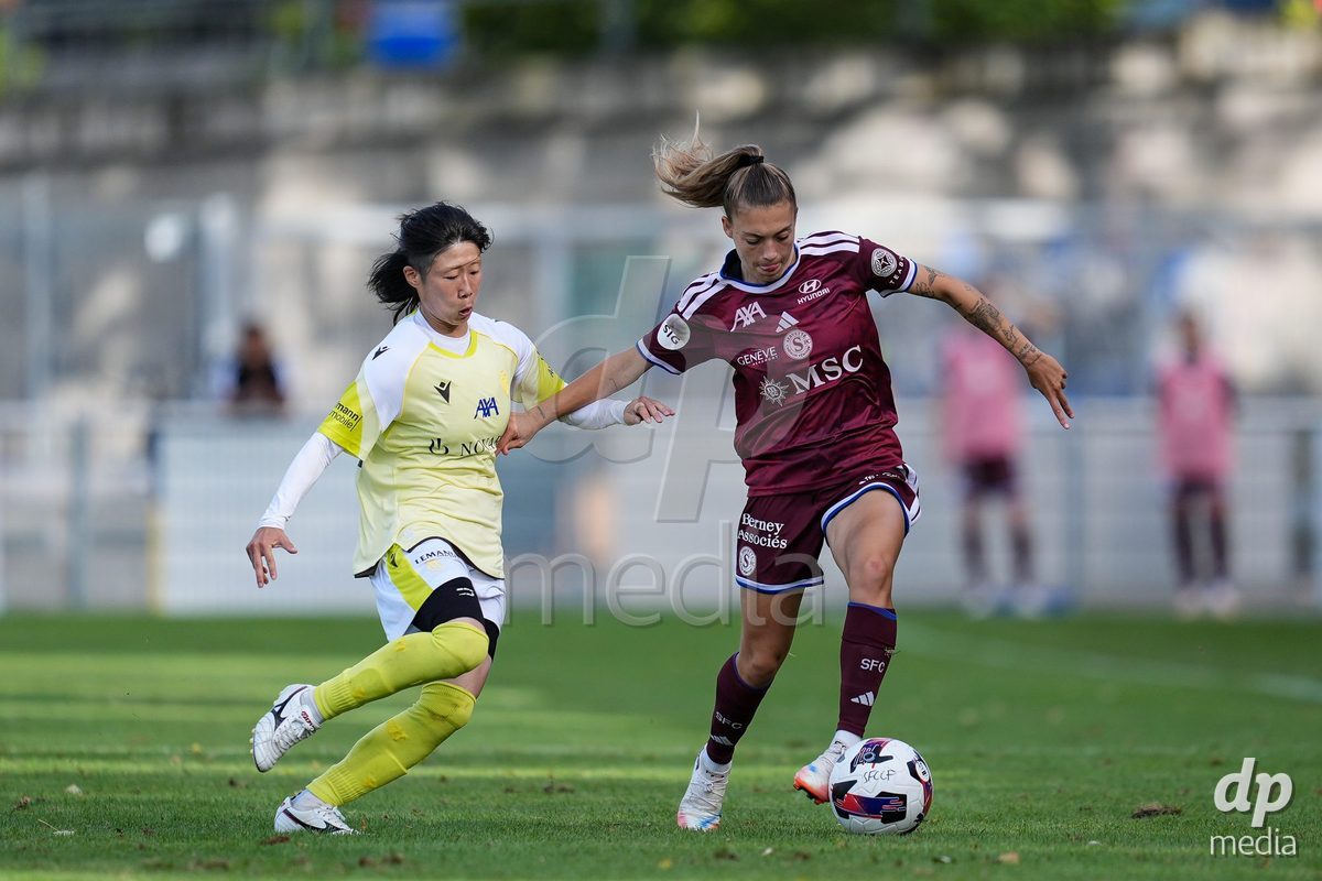 Geneva, Switzerland - August 29: Mai Hirata of FC Basel (L) and Ascension Martinez Salinas of Servette FC Chenois Feminin (R) battle for the ball (duel) during the AXA Women's Super League match between Servette FC Chenois Feminin and FC Basel 1893 at Stade de Trois-Chene on August 29, 2026 in Geneva, Switzerland.