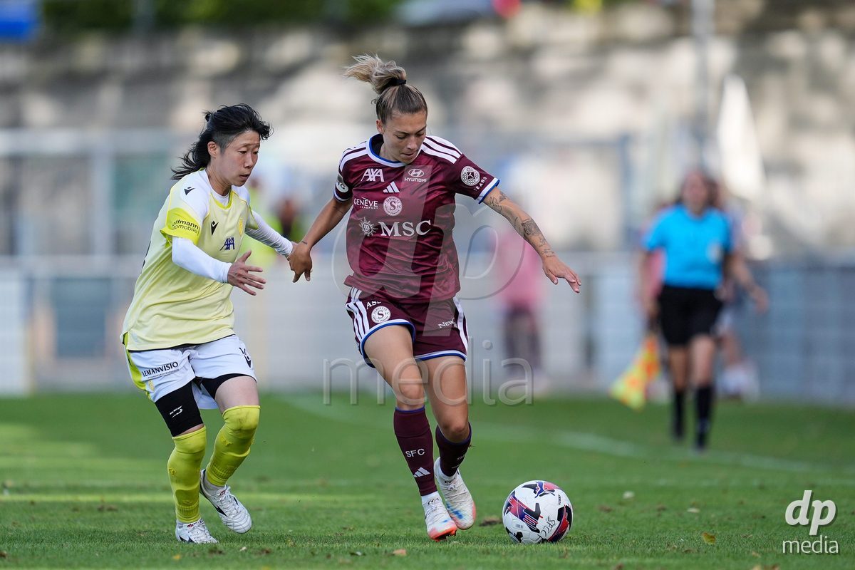 Geneva, Switzerland - August 29: Mai Hirata of FC Basel (L) and Ascension Martinez Salinas of Servette FC Chenois Feminin (R) battle for the ball (duel) during the AXA Women's Super League match between Servette FC Chenois Feminin and FC Basel 1893 at Stade de Trois-Chene on August 29, 2026 in Geneva, Switzerland.