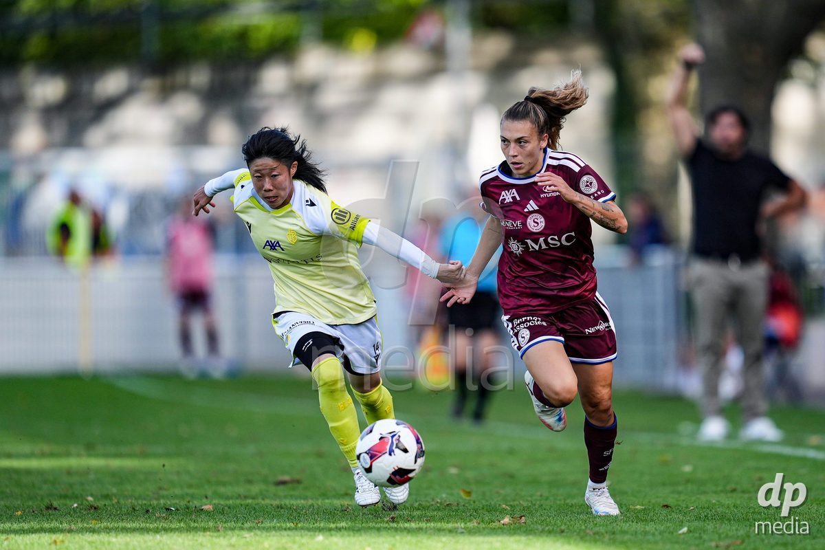 Geneva, Switzerland - August 29: Mai Hirata of FC Basel (L) and Ascension Martinez Salinas of Servette FC Chenois Feminin (R) battle for the ball (duel) during the AXA Women's Super League match between Servette FC Chenois Feminin and FC Basel 1893 at Stade de Trois-Chene on August 29, 2026 in Geneva, Switzerland.