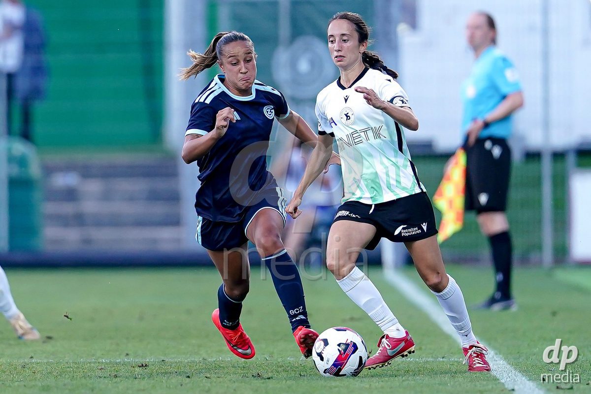 Yverdon-les-Bains, Switzerland - August 29: Dalila Belen Ippolito of GC Frauenfussball (L) and Ilona Guede Redondo of Yverdon Sport Women (R) battle for the ball during the AXA Women's Super League match between FC Yverdon Women and GC Frauenfussball at Stade Municipal on August 29, 2026 in Yverdon-les-Bains, Switzerland.
