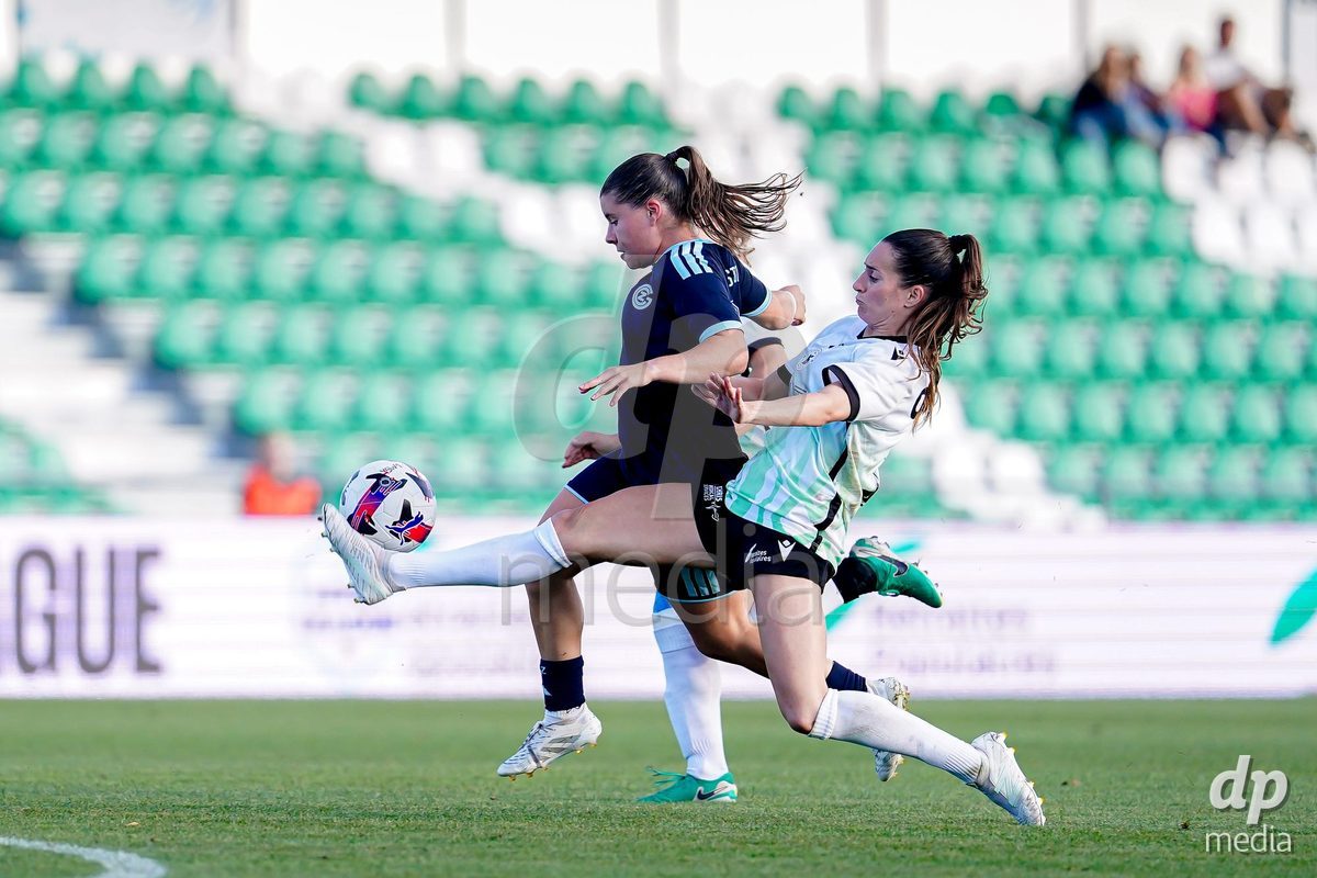 Yverdon-les-Bains, Switzerland - August 29: Michelle Storni of GC Frauenfussball (L) and Andrea Maddalen Sierra Larrauri of Yverdon Sport Women (R) battle for the ball during the AXA Women's Super League match between FC Yverdon Women and GC Frauenfussball at Stade Municipal on August 29, 2026 in Yverdon-les-Bains, Switzerland.
