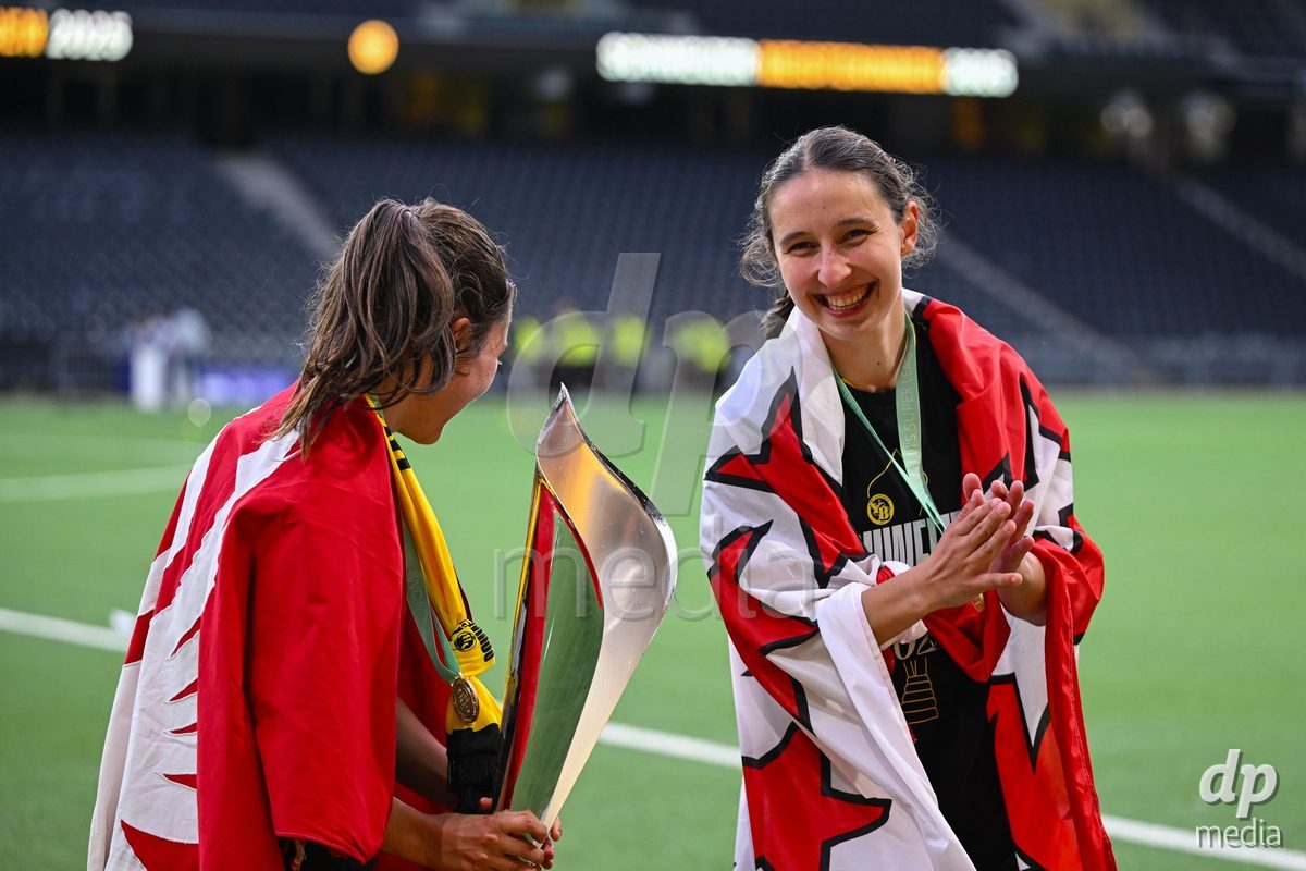 17/05/2025, Bern, Stadion Wankdorf, Women's Super League Final 2: BSC YB Frauen - GC Frauenfussball,  #19 Audrey Remy (BSC YB Frauen, left) and #13 Malaurie Granges (BSC YB Frauen, right) with the trophy