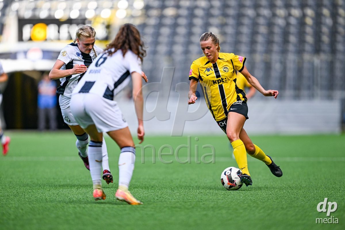 Athena Kuehn (12 Young Boys) in action against Romy Baraniak (25 Zurich) and Luana Burge (6 Zurich) during the Axa Womens Super League Football game between BSC Young Boys Frauen and FC Zürich Frauen at Wankdorf Stadium in Bern, Switzerland.