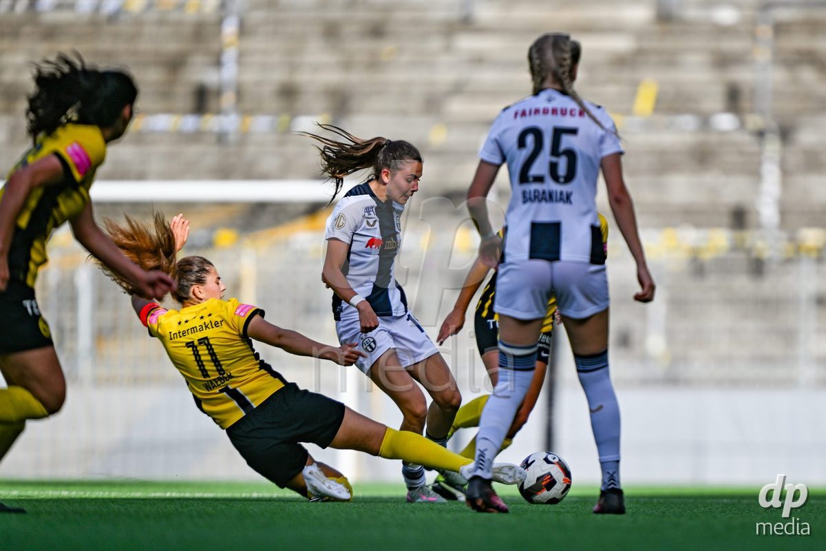 Stephanie Waeber (Young Boys) in duel with Borbala Dora Vincze (19 Zurich) during the Axa Womens Super League Football game between BSC Young Boys Frauen and FC Zürich Frauen at Wankdorf Stadium in Bern, Switzerland.
