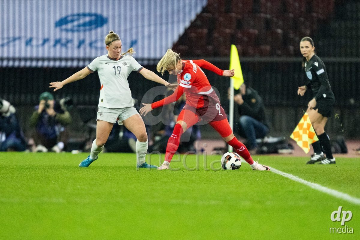 Ana-Maria Crnogorcevic (9 Switzerland) in action against Saedis Heioarsdottir (19 Island) during the UEFA Women's Nations League game between Switzerland and Island at Stadion Letzigrund in Zurich, Switzerland.