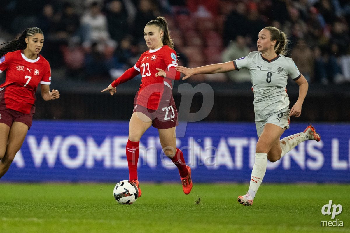 Alena Bienz (23 Switzerland) in action against Alexandra Johannsdottir (8 Island) during the UEFA Women's Nations League game between Switzerland and Island at Stadion Letzigrund in Zurich, Switzerland.