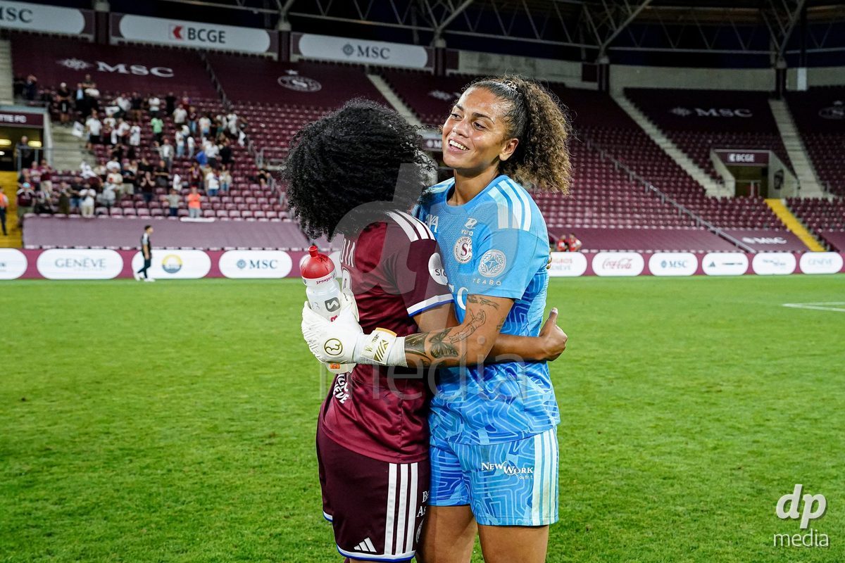 Geneva, Switzerland - September 2:  Mickaella Francoise Halooa Cardia of Servette FC Chenois Feminin and Jacintha Anouchka Weimar of Servette FC Chenois Feminin celebraate the victory and entry into the UWCL league phase after the UEFA Women's Champions League match between Servette FC Chenois Feminin and AC Sparta Praha at Stade de Geneve on September 2, 2026 in Geneva, Switzerland.