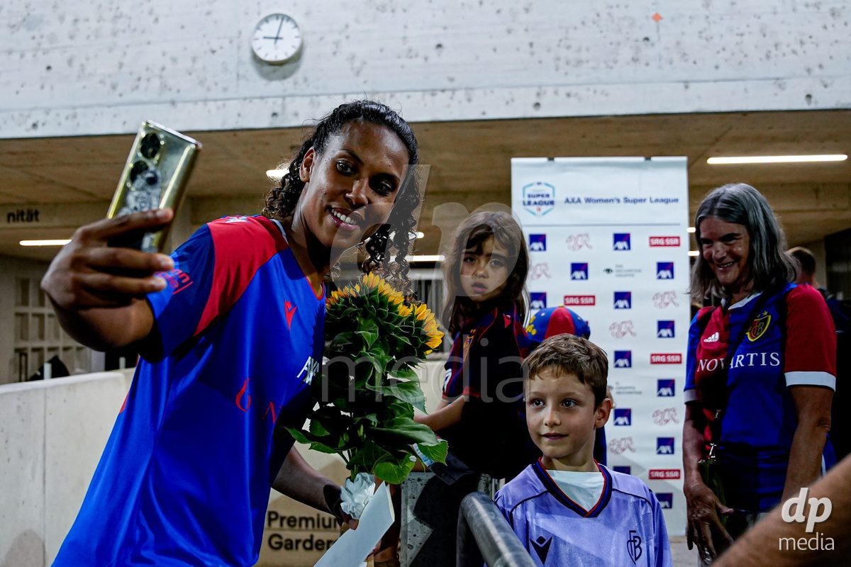 Basel, Switzerland - September 4: Coumba Sow of FC Basel 1893 with fans after the AXA Women's Super League match between FC Basel 1893 and FC St. Gallen 1879 at Leichtathletikstadion on September 4, 2026 in Basel, Switzerland.