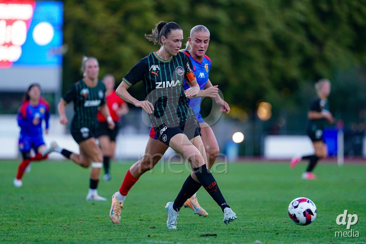 Basel, Switzerland - September 4: Jana Brunner of St.Gallen 1879 (L) battle for the ball during the AXA Women's Super League match between FC Basel 1893 and FC St. Gallen 1879 at Leichtathletikstadion on September 4, 2026 in Basel, Switzerland.
