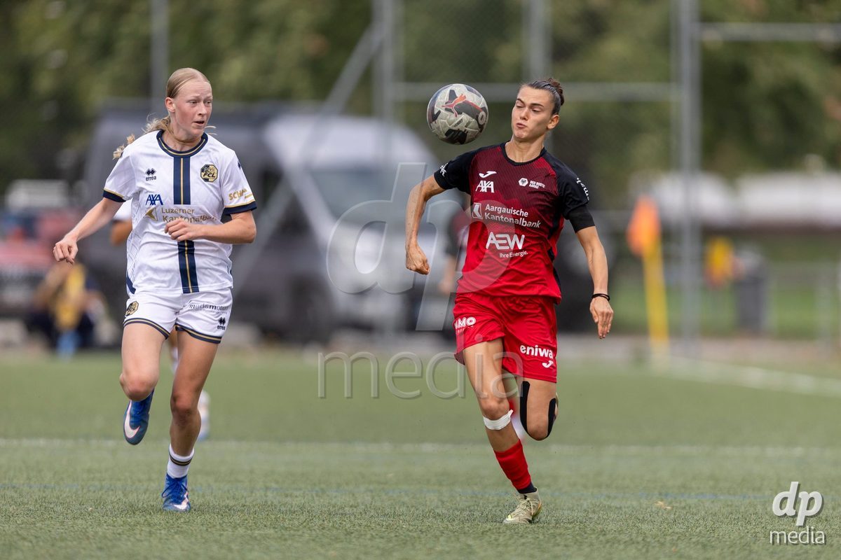 Aarau, Switzerland - September 5: XX during the AXA Women's Super League match between FC Aarau Frauen and FC Luzern at Sportanlage Schachen on September 5, 2026 in Aarau, Switzerland. Giulia Bison of FC Aarau Frauen (R) controls the ball under pressure from Mara Arnold of FC Luzern Frauen