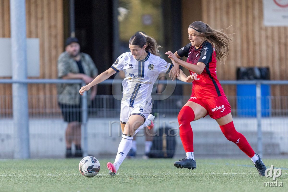 Aarau, Switzerland - September 5: Ramona Schallberger of FC Luzern Frauen (L) battles for the ball with Eriona Elezi of FC Aarau Frauen (R) during the AXA Women's Super League match between FC Aarau Frauen and FC Luzern at Sportanlage Schachen on September 5, 2026 in Aarau, Switzerland.