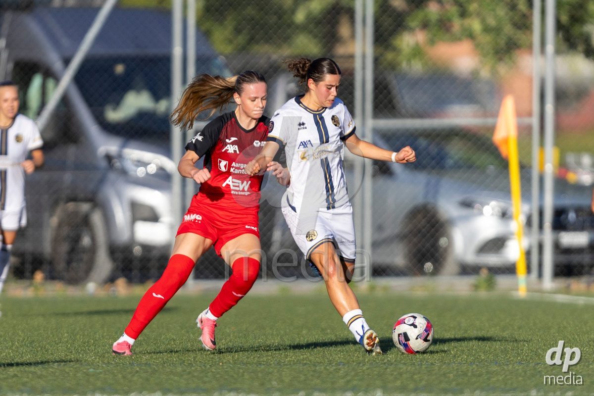 Aarau, Switzerland - September 5: Eliza Kadriu of FC Aarau Frauen (L) battles for the ball with Alyssa Keller of FC Luzern Frauen (R) during the AXA Women's Super League match between FC Aarau Frauen and FC Luzern at Sportanlage Schachen on September 5, 2026 in Aarau, Switzerland.