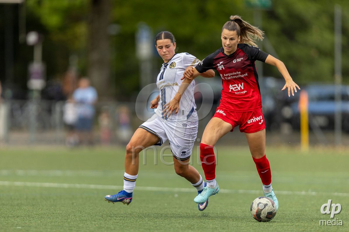 Aarau, Switzerland - September 5: Celia Hofer of FC Aarau Frauen (R) fights for the ball with Alyssa Keller of FC Luzern Frauen (L) during the AXA Women's Super League match between FC Aarau Frauen and FC Luzern at Sportanlage Schachen on September 5, 2026 in Aarau, Switzerland.