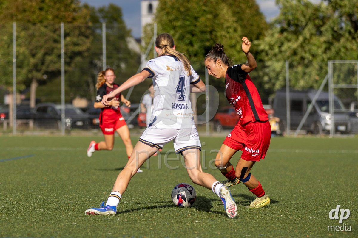 Aarau, Switzerland - September 5: Giulia Bison of FC Aarau Frauen (R) fights for the ball with Mara Arnold of FC Luzern Frauen (L) during the AXA Women's Super League match between FC Aarau Frauen and FC Luzern at Sportanlage Schachen on September 5, 2026 in Aarau, Switzerland.