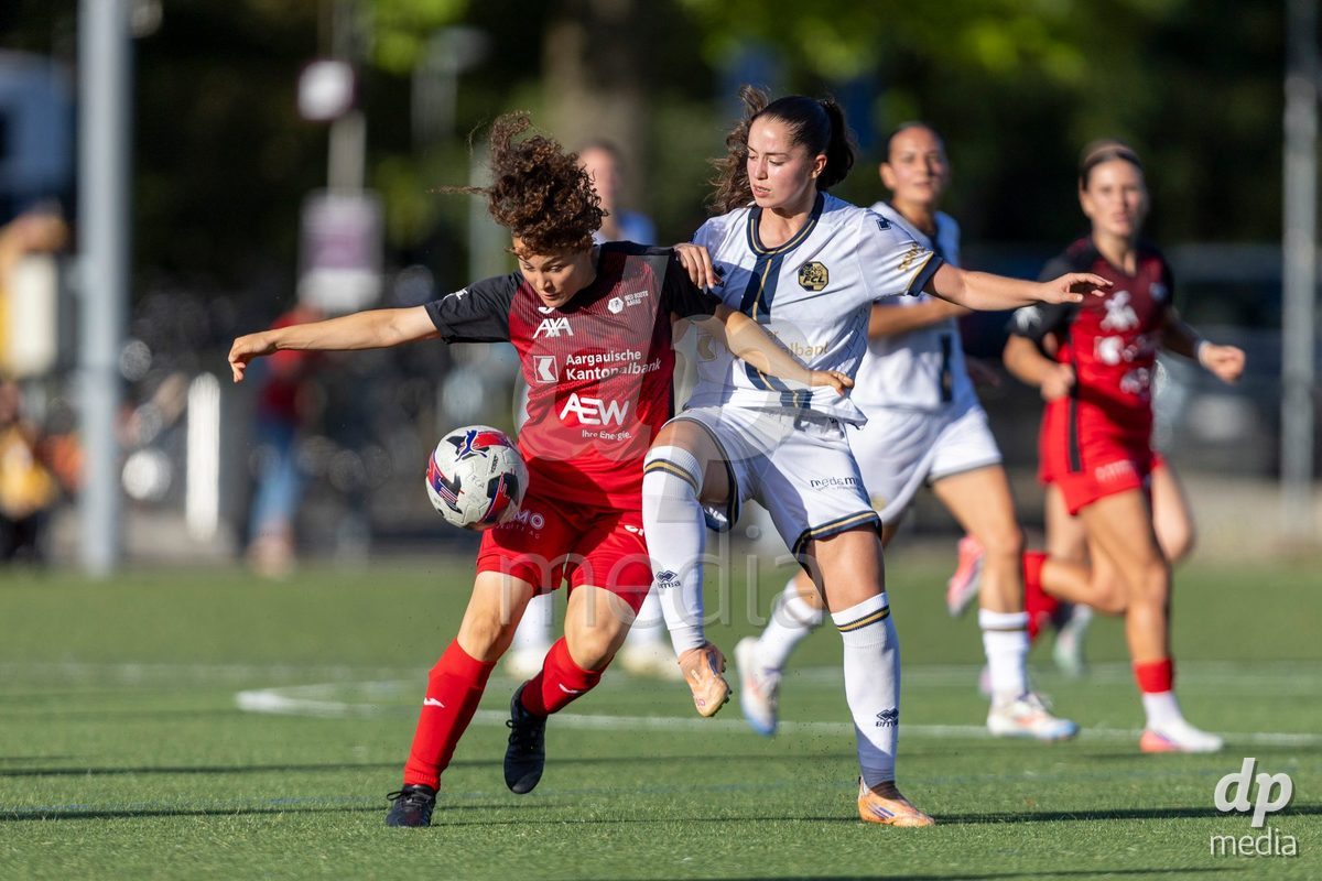 Aarau, Switzerland - September 5: Nathalie Widmer of FC Aarau Frauen (L) fights for the ball with Melissa Rondalli of FC Luzern Frauen (R) during the AXA Women's Super League match between FC Aarau Frauen and FC Luzern at Sportanlage Schachen on September 5, 2026 in Aarau, Switzerland.