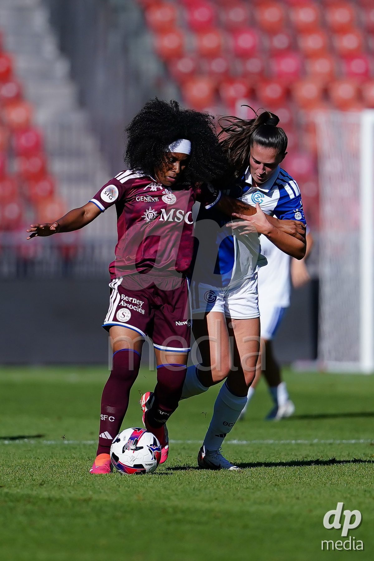 ZURICH, SWITZERLAND - September 6: Yllka Kadriu of GC Frauenfussball (R) and Mickaella Cardia (Mickaëlla Cardia) of Servette FC Chenois Feminin (L) battle for the ball during the AXA Women's Super League match between GC Frauenfussball and Servette FC Chenois Feminin at Letzigrund on September 6, 2026 in Zurich, Switzerland.