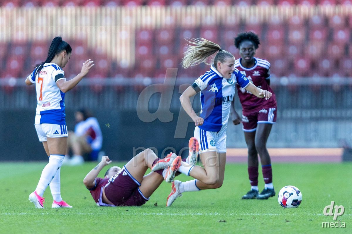ZURICH, SWITZERLAND - September 6: Gloria Marinelli of Servette FC Chenois Feminin (L) fights for the ball with Ella Ljustina of GC Frauenfussball during the AXA Women's Super League match between GC Frauenfussball and Servette FC Chenois Feminin at Letzigrund on September 6, 2026 in Zurich, Switzerland.
