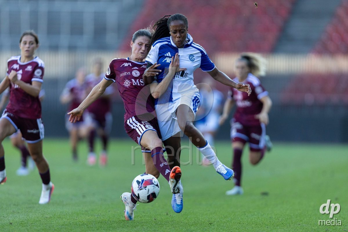 ZURICH, SWITZERLAND - September 6: Paige Bailey-Gayle of GC Frauenfussball (R) battles for the ball with Amanda Chaney of Servette FC Chenois Feminin (L)  during the AXA Women's Super League match between GC Frauenfussball and Servette FC Chenois Feminin at Letzigrund on September 6, 2026 in Zurich, Switzerland.