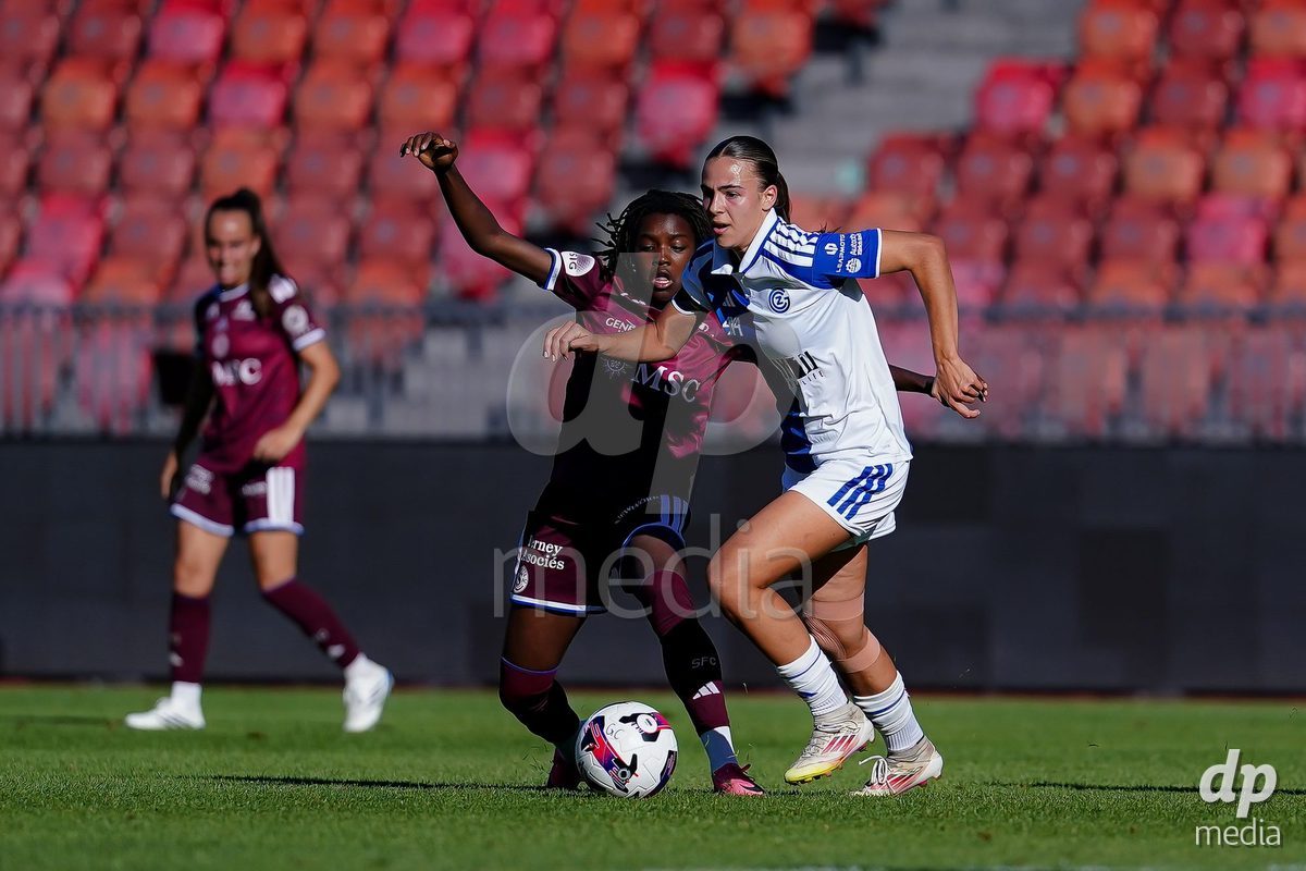 ZURICH, SWITZERLAND - September 6: Emma Egli of GC Frauenfussball (R) and Garance Nein of Servette FC Chenois Feminin  (L) battle for the ball during the AXA Women's Super League match between GC Frauenfussball and Servette FC Chenois Feminin at Letzigrund on September 6, 2026 in Zurich, Switzerland.
