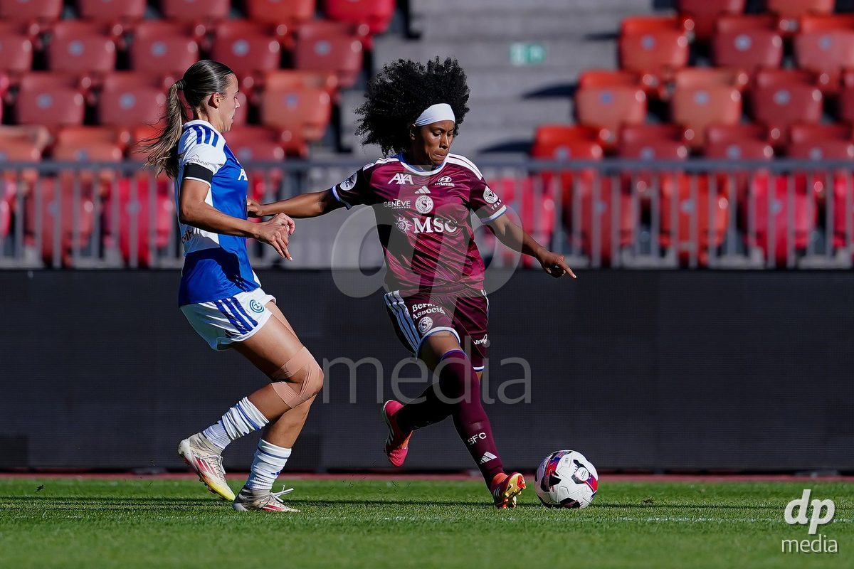 ZURICH, SWITZERLAND - September 6: Mickaella Cardia (Mickaëlla Cardia) of Servette FC Chenois Feminin (R) and Emma Egli of GC Frauenfussball (L) battle for the ball during the AXA Women's Super League match between GC Frauenfussball and Servette FC Chenois Feminin at Letzigrund on September 6, 2026 in Zurich, Switzerland.