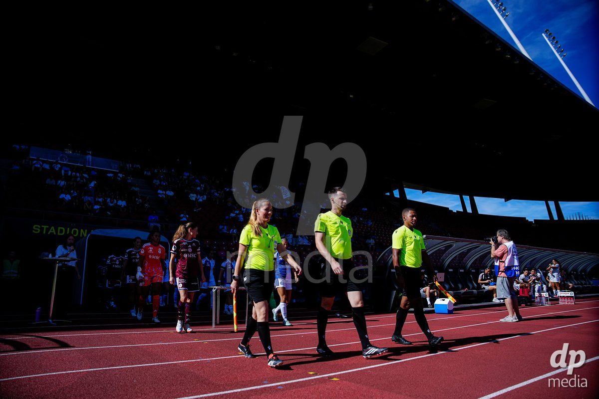 ZURICH, SWITZERLAND - September 6: Referees Roland Müller (Roland Muller) (R), Faruk Tutnjic (M) and Belinda Pierre- Brem (L) during the AXA Women's Super League match between GC Frauenfussball and Servette FC Chenois Feminin at Letzigrund on September 6, 2026 in Zurich, Switzerland.